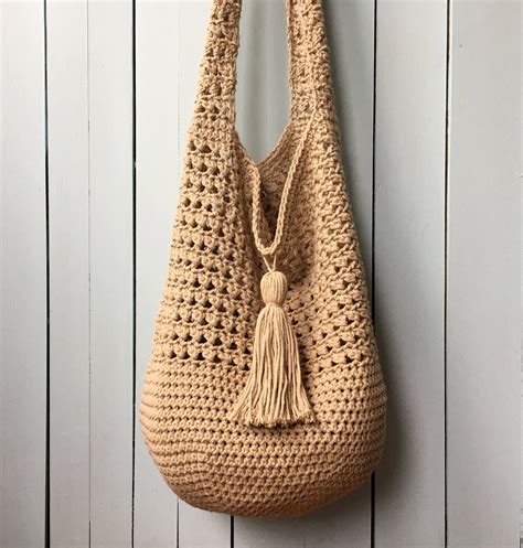 21 Free Crochet Bag Patterns. Roundup by Underground Crafter. Mini Crocodile Stitch Bag by KnitcroAddict: This textured bag pattern includes video and photo tutorials. Sea Shells by The Shore Market Bag by Nana’s Crafty Home: Use a self-striping yarn to make the colorwork on this beautiful bag easy. The pattern includes a video tutorial.